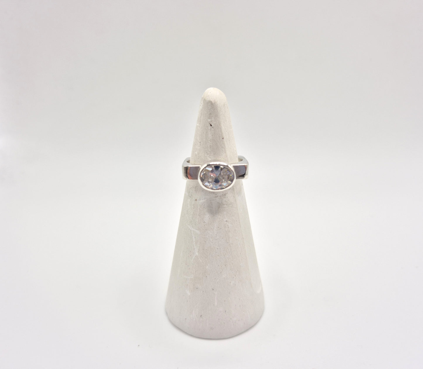  Cubic zirconia ring on white ring cone